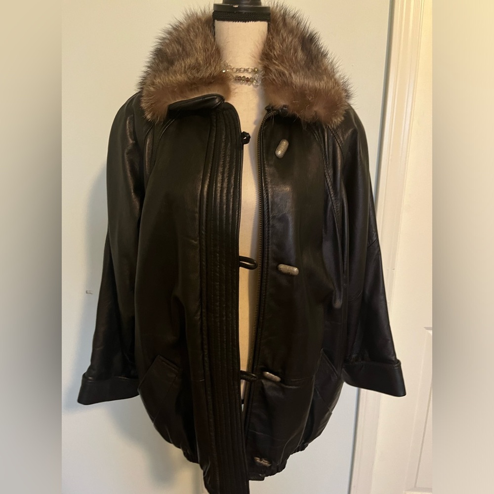 Warm Leather coat with fur trim